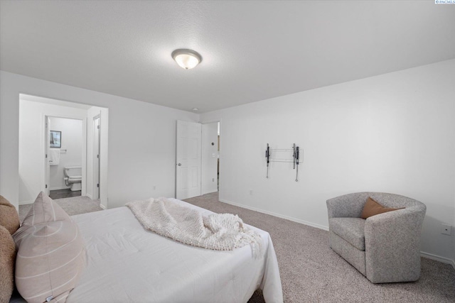 1713 W 39th Ave, Kennewick, WA 99337 - carpeted bedroom featuring baseboards and ensuite bathroom