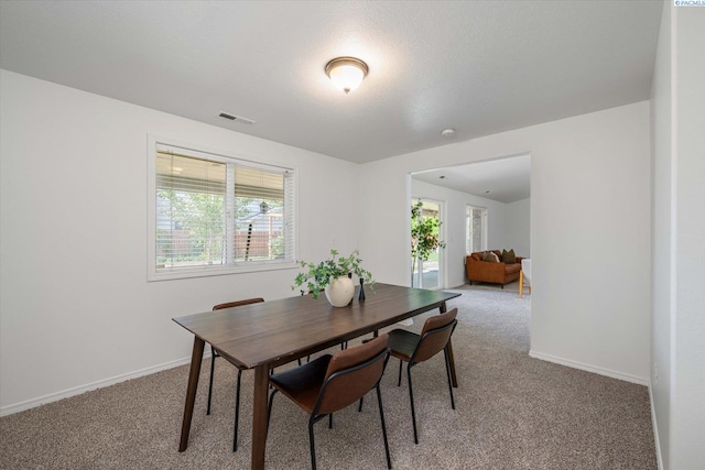 1713 W 39th Ave, Kennewick, WA 99337 - dining space featuring carpet and plenty of natural light