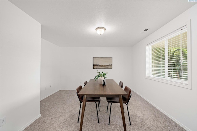 1713 W 39th Ave, Kennewick, WA 99337 - dining area featuring carpet flooring and baseboards