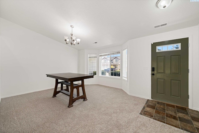 1713 W 39th Ave, Kennewick, WA 99337 - carpeted foyer entrance featuring a chandelier and healthy amount of natural light