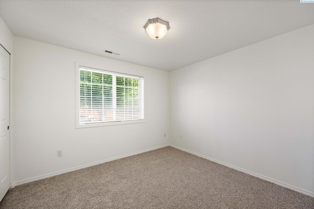 1713 W 39th Ave, Kennewick, WA 99337 - carpeted spare room featuring baseboards