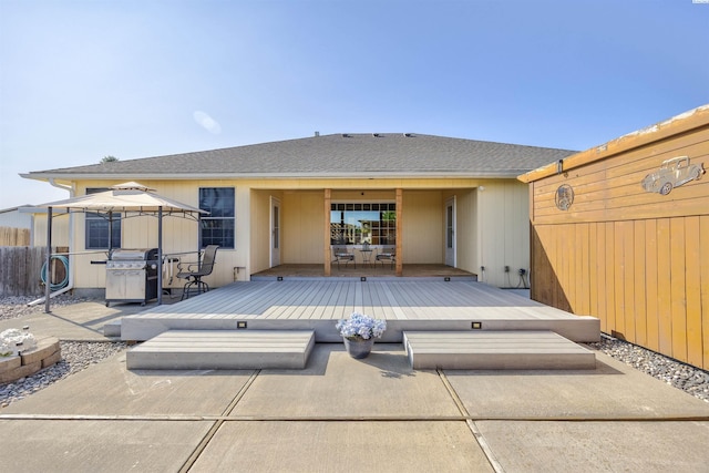 2532 W 32nd Ave, Kennewick, WA 99337 - back of house with a deck, a gazebo, a patio, and roof with shingles