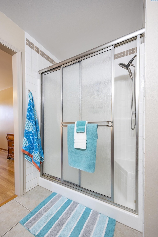 2532 W 32nd Ave, Kennewick, WA 99337 - bathroom featuring a shower stall and tile patterned floors