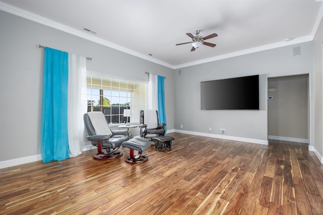 2532 W 32nd Ave, Kennewick, WA 99337 - exercise room featuring a ceiling fan, wood finished floors, and crown molding