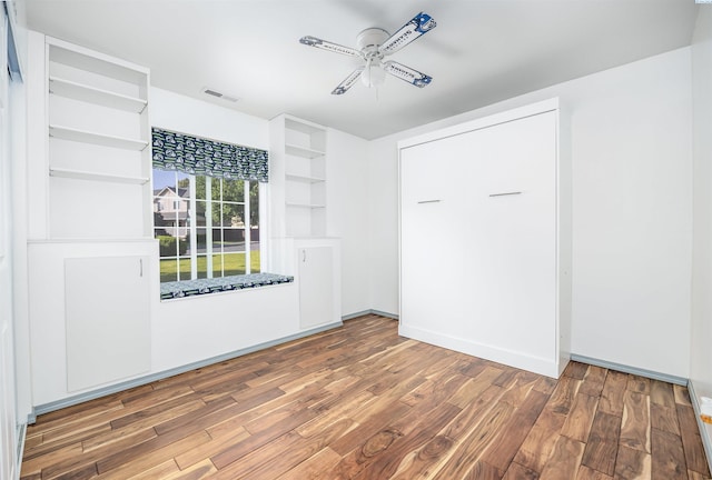 2532 W 32nd Ave, Kennewick, WA 99337 - unfurnished bedroom with wood finished floors and a ceiling fan