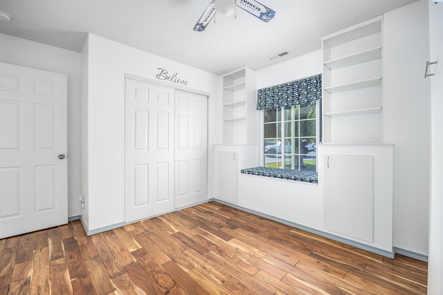 2532 W 32nd Ave, Kennewick, WA 99337 - unfurnished bedroom with wood finished floors and a closet