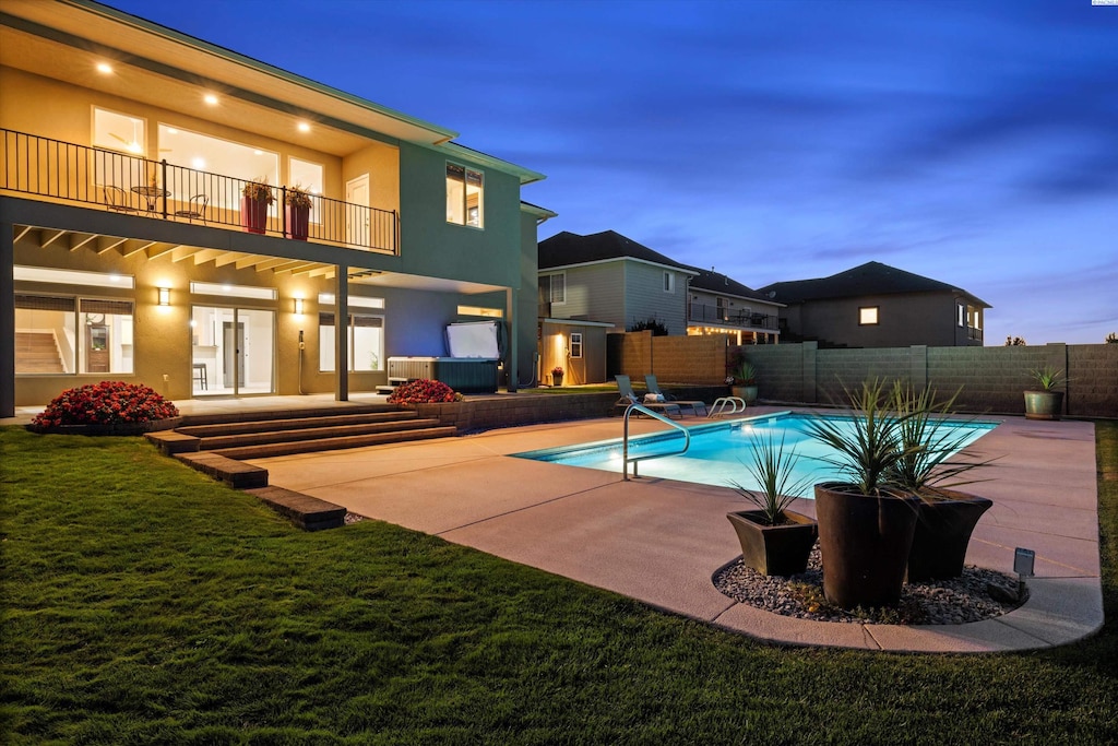 2200 W 50th Ave, Kennewick, WA 99337 - view of swimming pool featuring a fenced backyard, a patio area, a lawn, and a fenced in pool