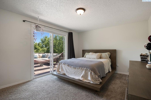 2132 Cascade Ave, Richland, WA 99354 - carpeted bedroom with access to exterior and a textured ceiling