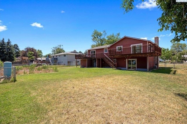 2132 Cascade Ave, Richland, WA 99354 - rear view of property featuring stairs, a deck, a fenced backyard, and a chimney