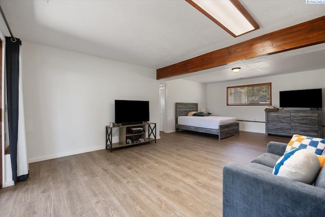 2132 Cascade Ave, Richland, WA 99354 - living area featuring light wood finished floors and beam ceiling