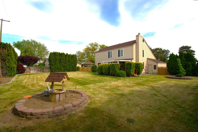 view of yard with fence