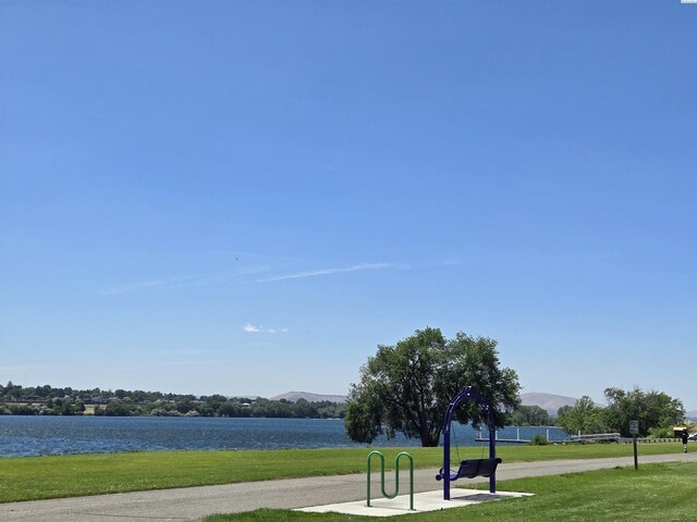 5307 W Irving St, Pasco, WA 99301 - view of community featuring a lawn and a water and mountain view