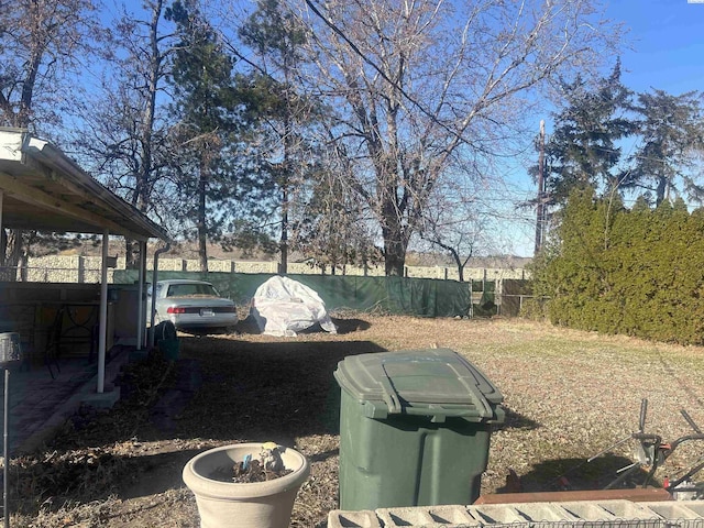 view of yard featuring fence