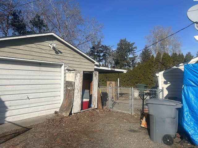 exterior space featuring a gate and fence