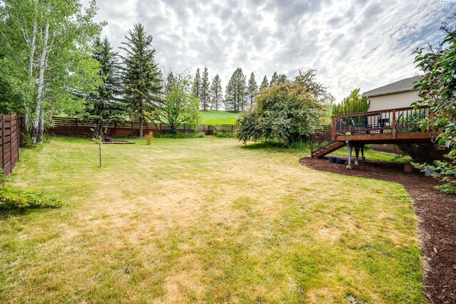 495 NW Robert St, Pullman, WA 99163 - view of yard with a wooden deck and stairs