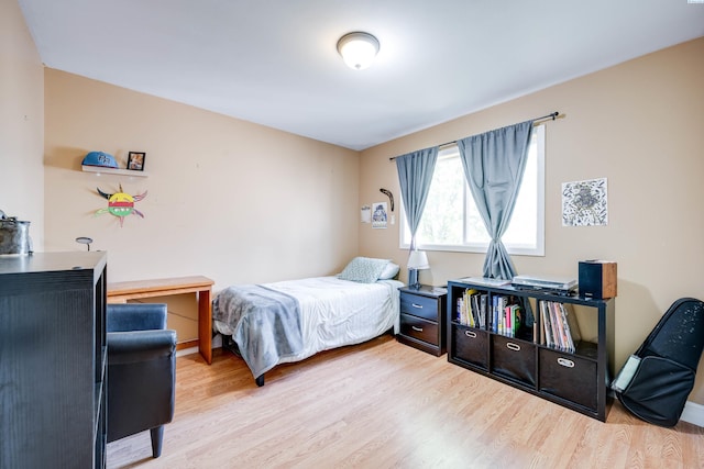 495 NW Robert St, Pullman, WA 99163 - bedroom with light wood-type flooring and baseboards