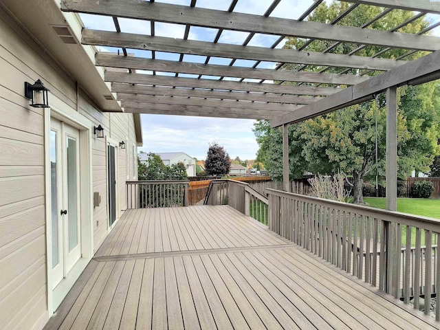 wooden deck with fence and a pergola