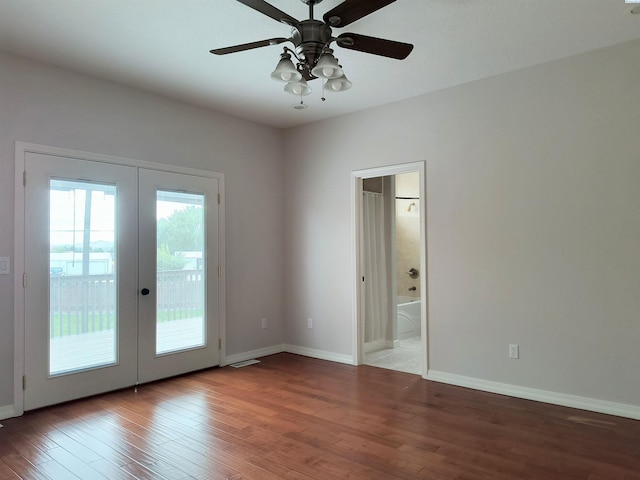 unfurnished room featuring ceiling fan, french doors, wood finished floors, and baseboards