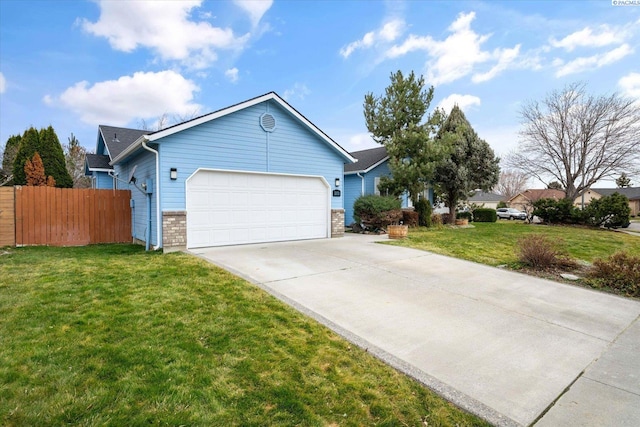 view of front facade featuring a garage, driveway, fence, a front yard, and brick siding