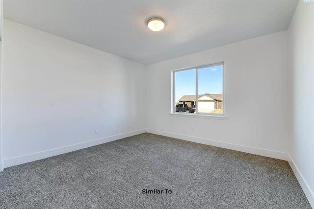 1608 Diamond Ave, Grandview, WA 98930 - unfurnished room with carpet floors and baseboards