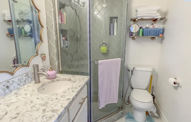 420 SE Dexter St, Pullman, WA 99163 - full bath featuring toilet, a shower stall, vanity, and baseboards