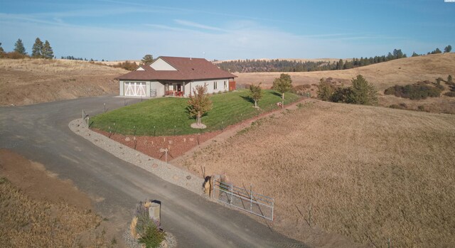 birds eye view of property featuring a rural view