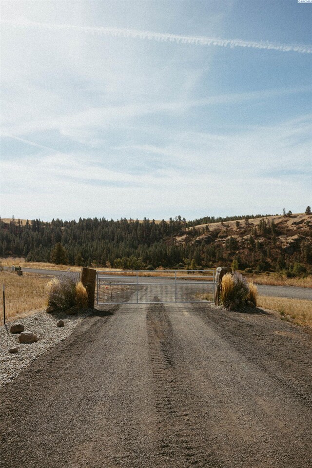 view of road featuring a rural view