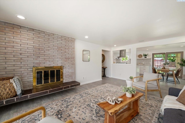 2115 W 8th Pl, Kennewick, WA 99336 - living room featuring wood finished floors, baseboards, recessed lighting, and a fireplace