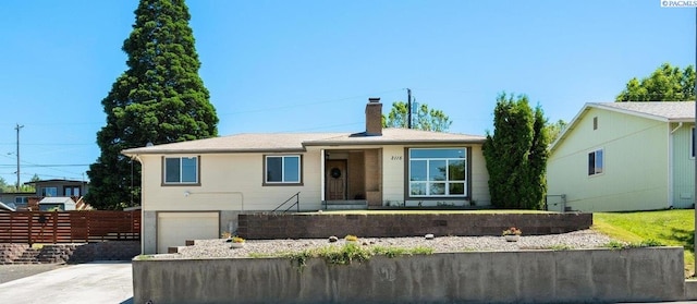 2115 W 8th Pl, Kennewick, WA 99336 - single story home featuring a garage, a chimney, and driveway