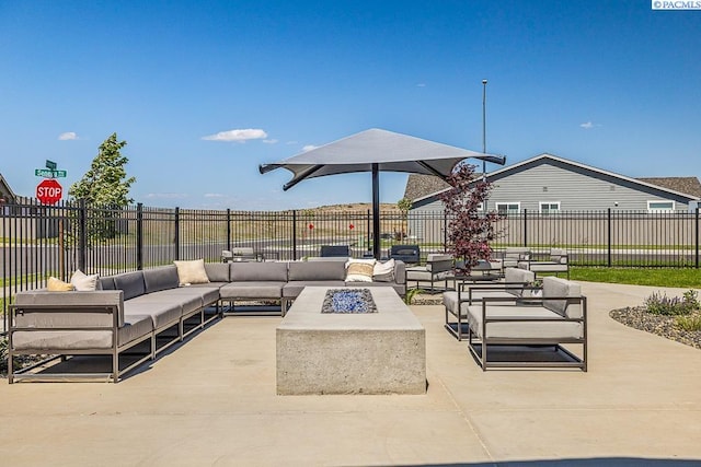 2817 Avrio Ave, Richland, WA 99354 - view of patio / terrace with an outdoor living space with a fire pit and fence