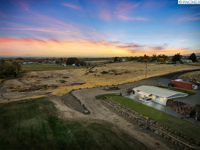 aerial view at dusk with a rural view