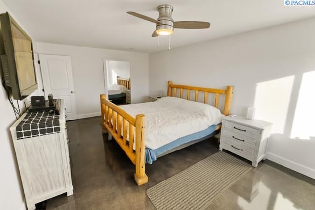 bedroom featuring radiator heating unit and ceiling fan