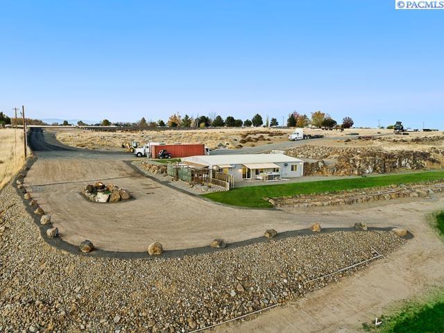 view of yard with a rural view