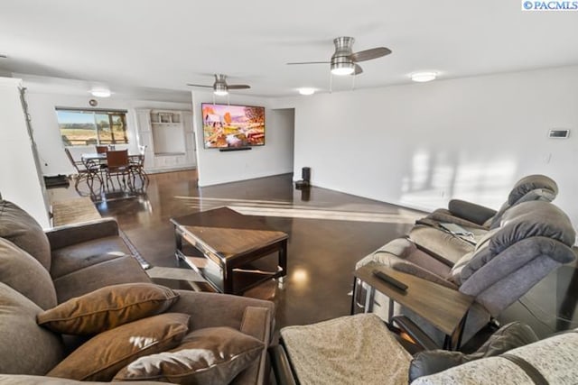 living room featuring ceiling fan