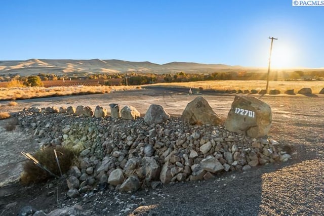 exterior space with a rural view