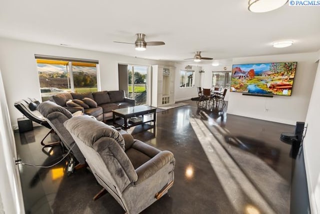 living room featuring concrete flooring