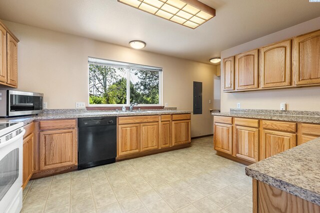 2020 Newcomer Ave, Richland, WA 99354 - kitchen featuring dishwasher, stainless steel microwave, white range with electric cooktop, electric panel, and light countertops