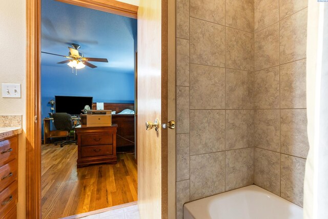 2020 Newcomer Ave, Richland, WA 99354 - bathroom with wood finished floors, a ceiling fan, and vanity