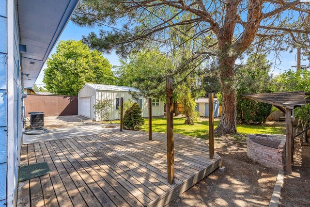 2020 Newcomer Ave, Richland, WA 99354 - wooden deck with an outbuilding and a garage