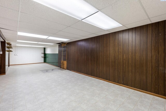 2020 Newcomer Ave, Richland, WA 99354 - finished basement with a drop ceiling, wood walls, and light flooring