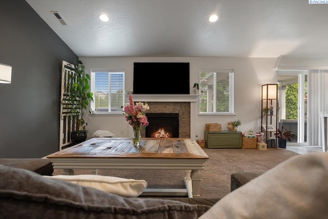 2909 S Jean St, Kennewick, WA 99336 - living area featuring a lit fireplace and carpet floors
