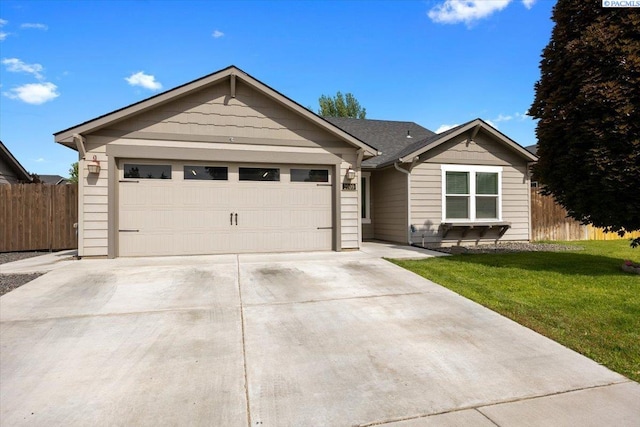 2909 S Jean St, Kennewick, WA 99336 - ranch-style house featuring concrete driveway and an attached garage