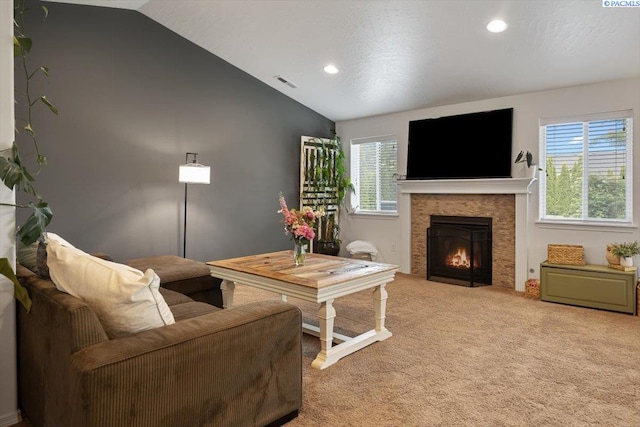 2909 S Jean St, Kennewick, WA 99336 - living room with vaulted ceiling, carpet flooring, a fireplace with flush hearth, and recessed lighting