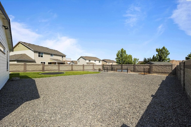 874 Pikes Peak Dr, West Richland, WA 99353 - fenced backyard with a residential view