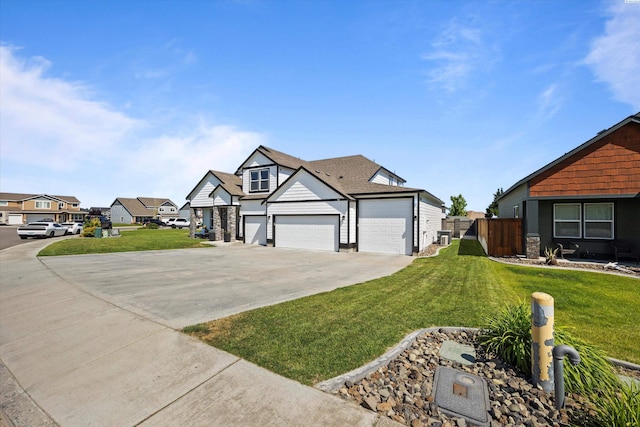 874 Pikes Peak Dr, West Richland, WA 99353 - view of front of property with concrete driveway, central AC, and a residential view