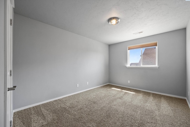 874 Pikes Peak Dr, West Richland, WA 99353 - carpeted spare room with baseboards