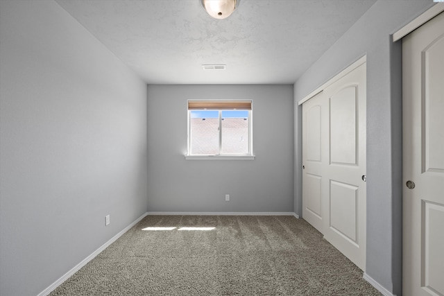 874 Pikes Peak Dr, West Richland, WA 99353 - unfurnished bedroom featuring carpet flooring and baseboards