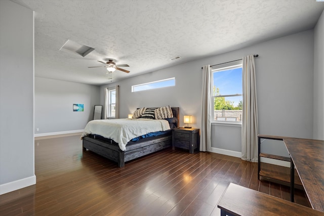 874 Pikes Peak Dr, West Richland, WA 99353 - bedroom with multiple windows, baseboards, a textured ceiling, and ceiling fan