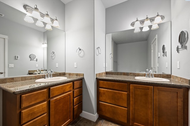 874 Pikes Peak Dr, West Richland, WA 99353 - full bath with two vanities and tile patterned floors