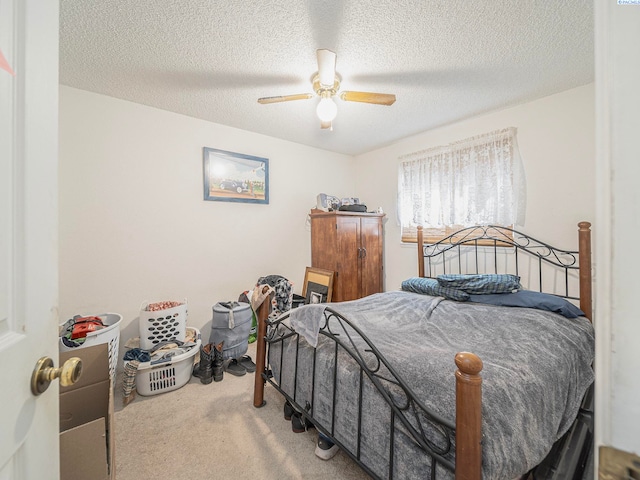 902 W 44th Pl, Kennewick, WA 99337 - bedroom with carpet, a ceiling fan, and a textured ceiling